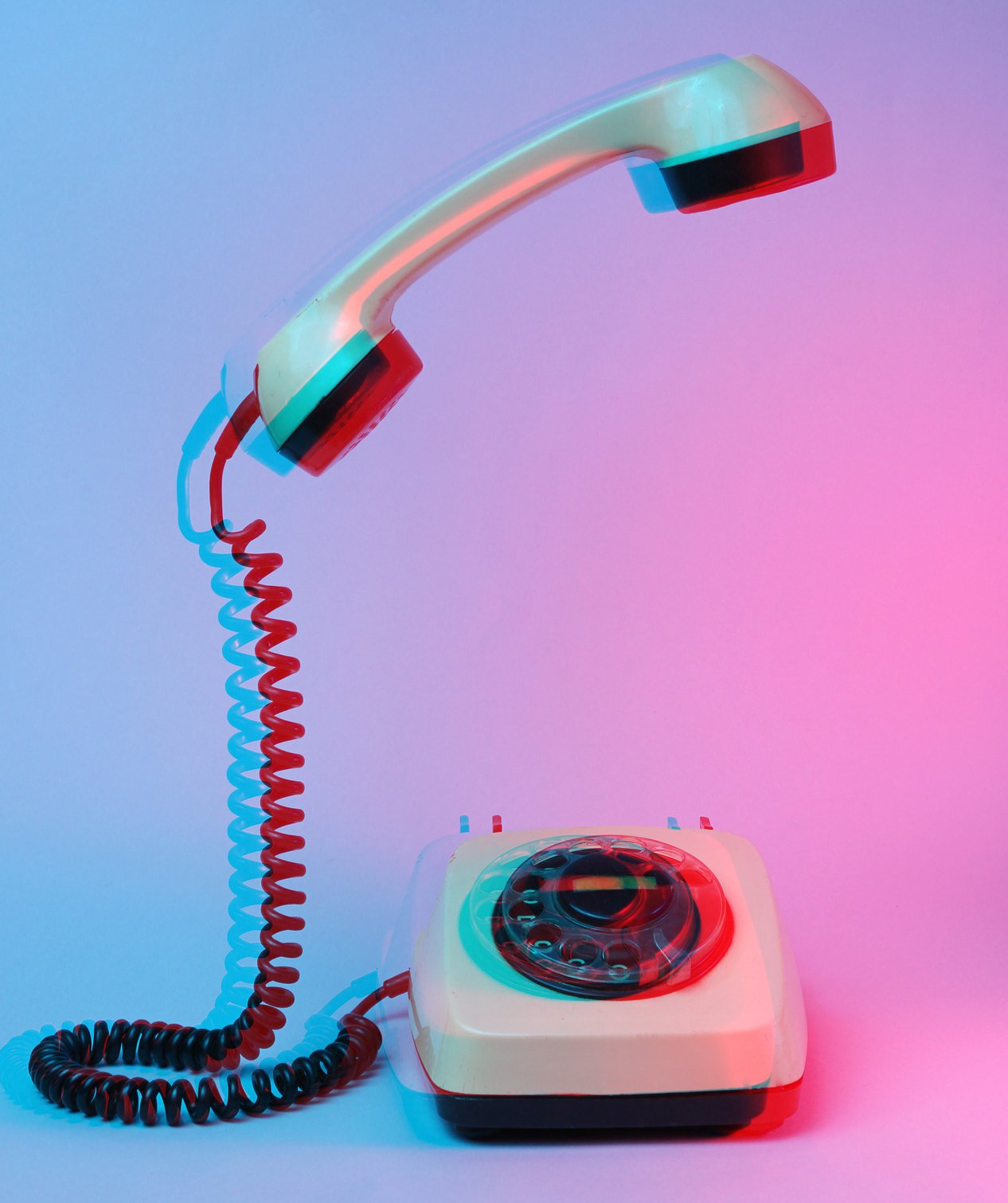 Glitch effect Old style rotary telephone with soaring telephone handle, blue red neon light, 80s